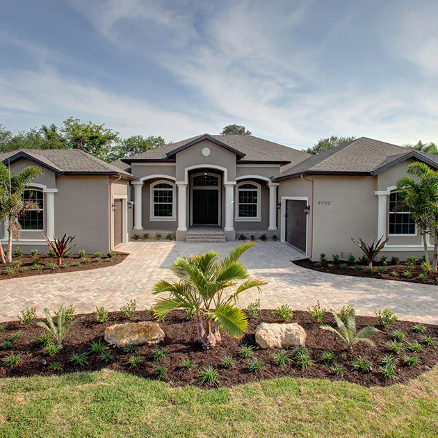 Photo of a front yard and house