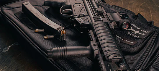 Close up of assault rifle with magazine detached