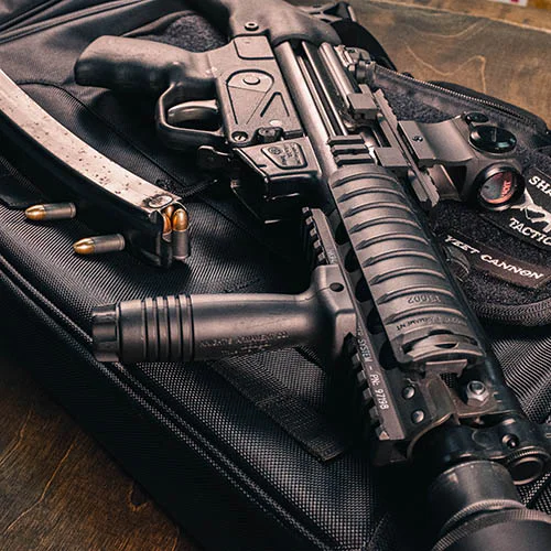 Close up of assault rifle with magazine detached